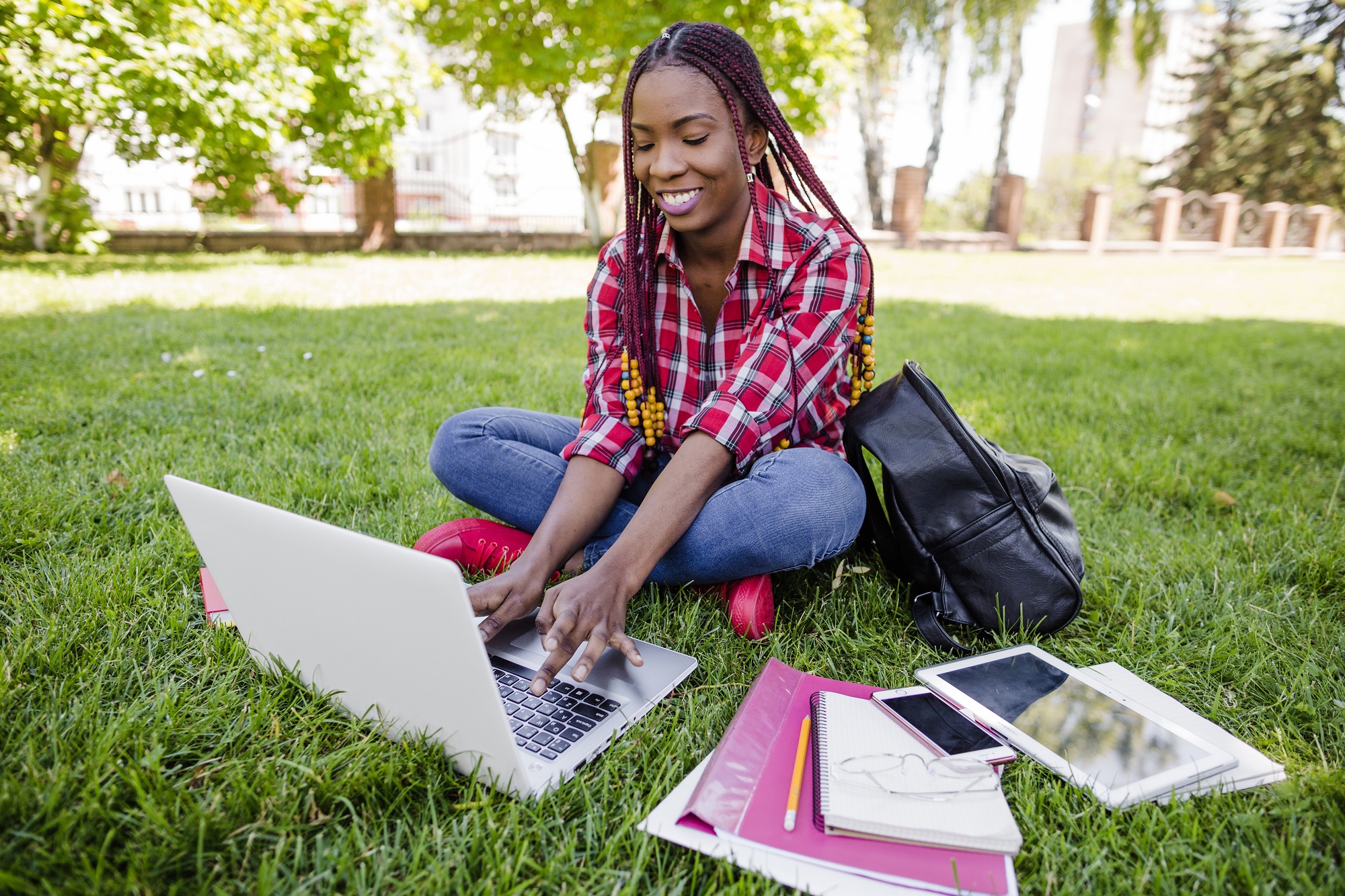 Student studying outdoors near Moi University in Eldoret